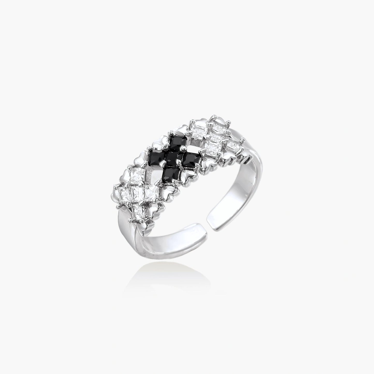 Adjustable white gold plated ring with geometric grid of black and clear zirconia stones in checkerboard pattern