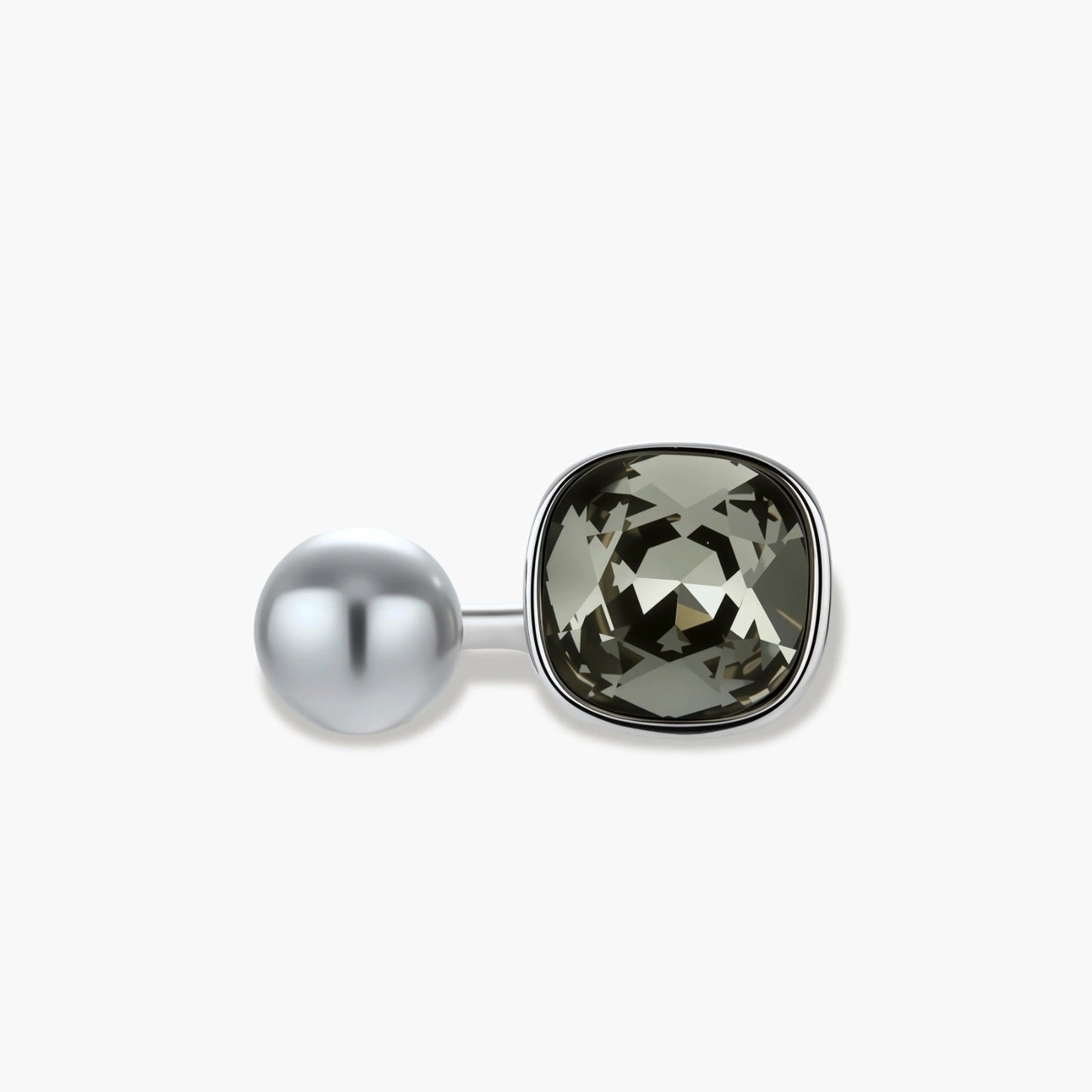 Modern adjustable ring with smoky zircon stone and metallic sphere in platinum-plated copper finish on neutral background.